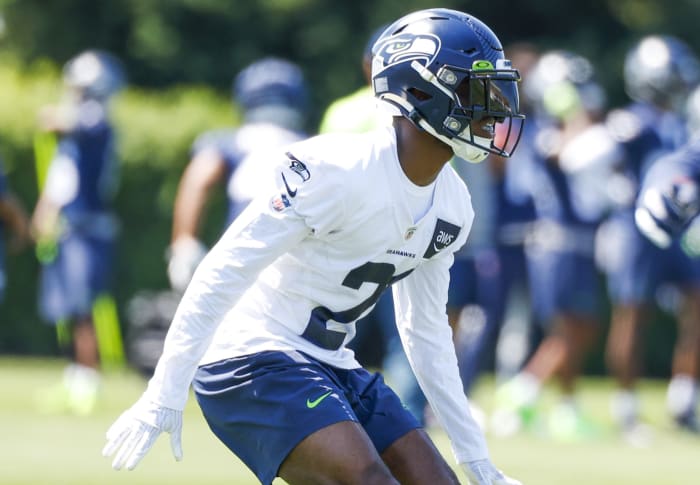 Seattle Seahawks cornerback Devon Witherspoon (21) participates in training camp practice at the Virginia Mason Athletic Center.